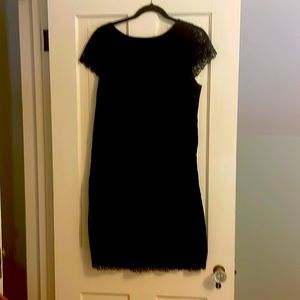 Black lace covered dress.